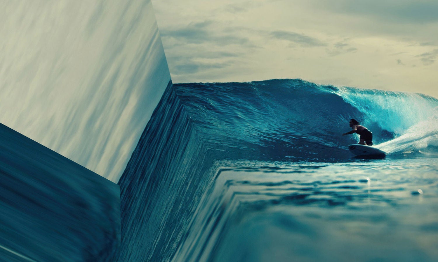 Surfer riding a wave toward a surreal ocean edge that appears to drop into space